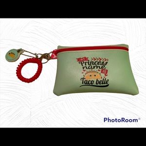 Handcrafted Taco bag in soft mint green vinyl . Hot pink wristlet lobster clasp